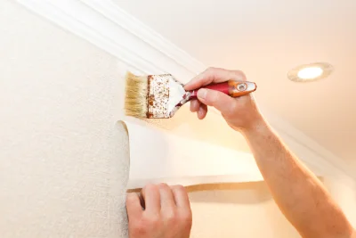 Pose de papier peint à la Bénisson-Dieu — revêtements muraux et toiles de verre